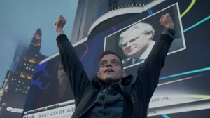 A man raises his hands in triumph