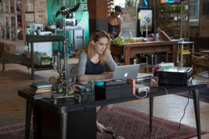 A woman browsing her Macbook